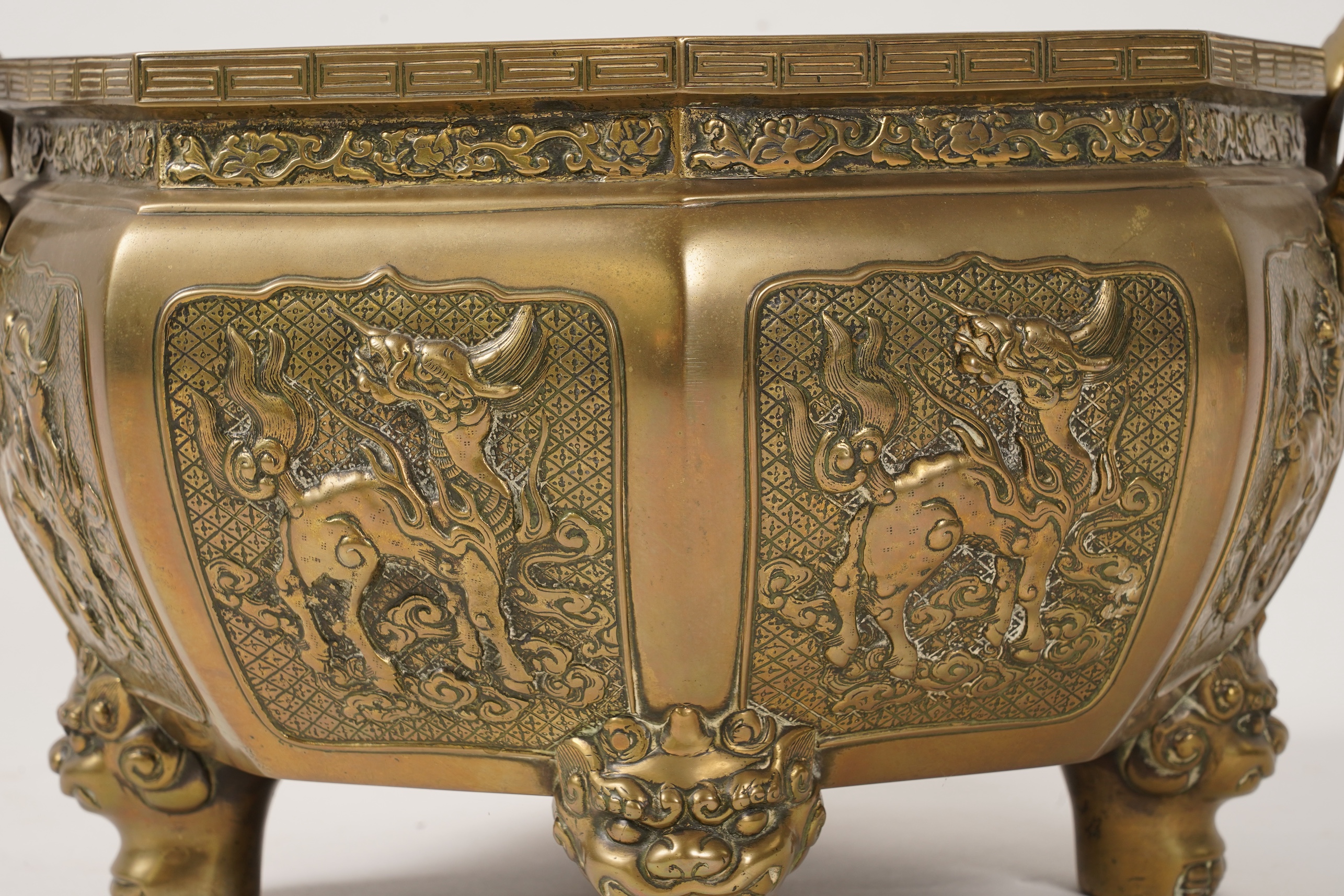 A large Chinese or Japanese bronze octagonal jardiniere, 19th century